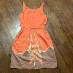 Orange and brown sundress with bird design